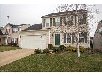 Mature landscaping gives this inviting home great 