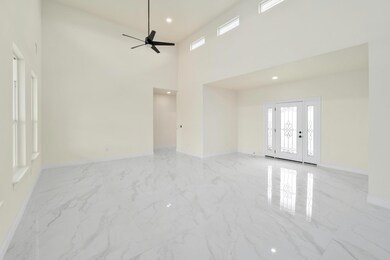 Empty room with baseboards, recessed lighting, a 