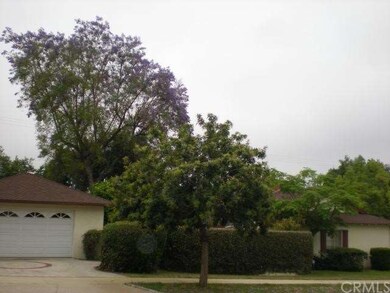 side view of home and garage drive
