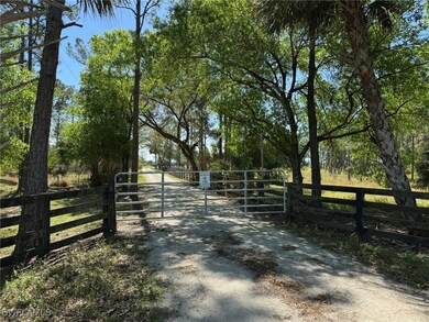 View of gate featuring a rural view