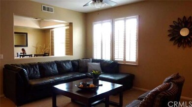 Living room open to formal dining room
