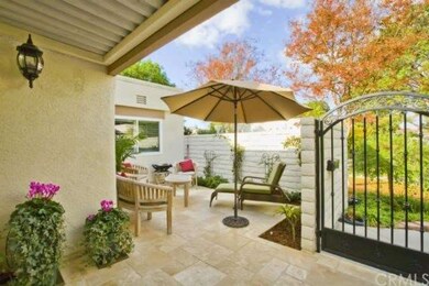 Enter into the patio through a custom wrought iron