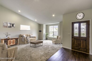 Virtually staged entry and living room