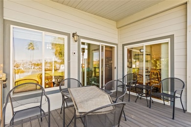 Wooden terrace featuring outdoor dining space