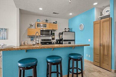 To the right of the breakfast bar is a pull-out pa