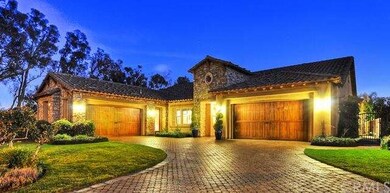 Front view of the home. Single level, 4 car garage