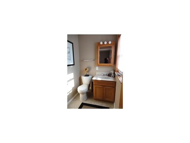Bathroom. Rare to have a master half bath in this 