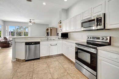 The open kitchen space joins the dining room to th