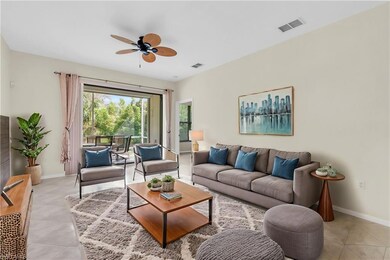 Tiled living room with ceiling fan