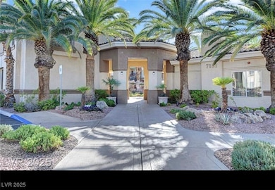Property entrance with stucco siding