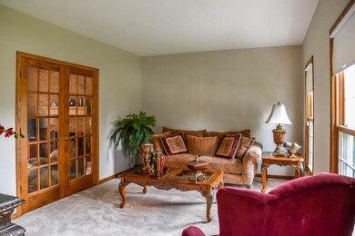 Living room with French doors to the family room.