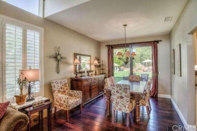 Formal dining room is opens to enormous backyard f