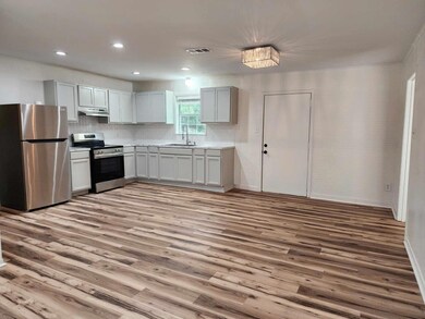 Kitchen featuring light hardwood / wood-style floo