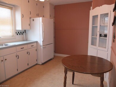 Eat in kitchen with pantry and built in hutch.