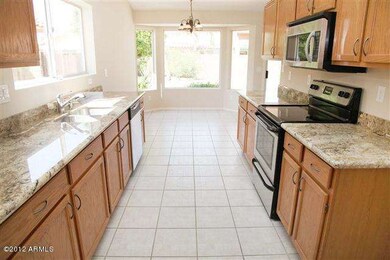 KITCHEN TOWARDS DINING