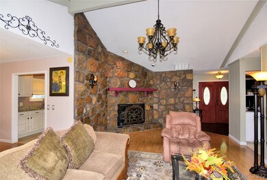 Spacious Living, Dramatic Stone Hearth F/P with Gl