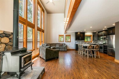 Spacious area for gathering near the fireplace and