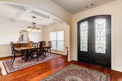 Foyer featuring french doors, dark hardwood / wood