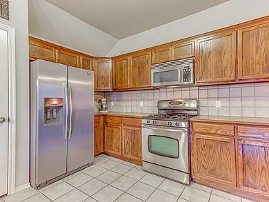 Kitchen. Kitchen has plenty of cabinets.