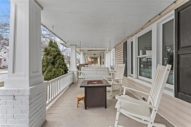 Enjoy your morning coffee on the charming front porch