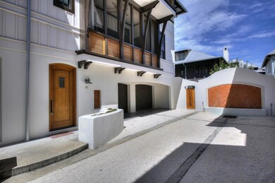 front door and 2 car garage