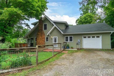 Main level garage and room for parking multiple cars.