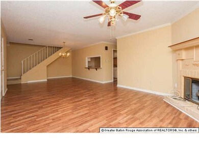 Open floor plan - new laminate wood floor in LR/DR