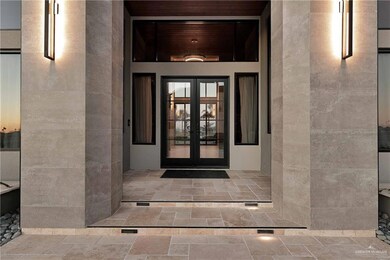Entrance to property featuring french doors