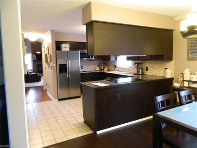 Updated kitchen w/ceramic tiled floor, includes al