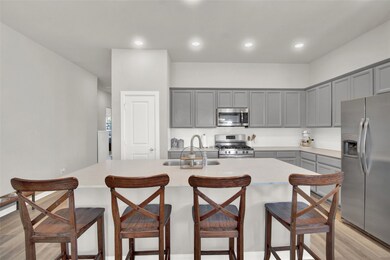 Another view of the kitchen from the family room