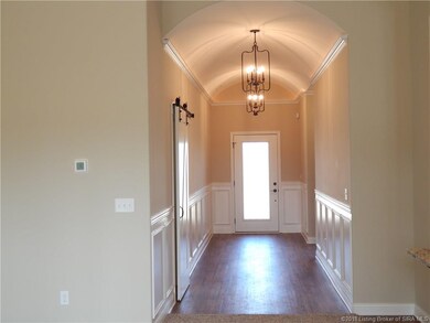 Beautiful barrel foyer with sliding Farm House sty