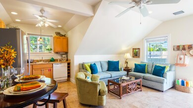 3-1025WHITEHEADunitA-16x9-living&dining