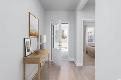 Entrance foyer with baseboards, french doors, and 