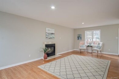 Family Room with Gas Fireplace and marble surround