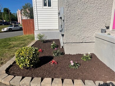 Nicely landscaped bed with brand new plantings-