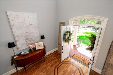 A beautifully arched transom above the double door