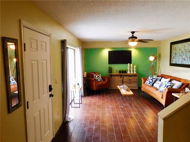 Great room with sliding glass doors to the patio.