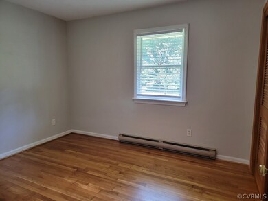 Bedroom 1 Refinished hardwoods