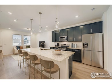 Grand Kitchen Island with upgraded appliances and soft close cabinetry.
