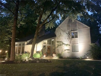 stone & cedar mid century modern colonial with eve