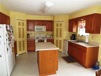 Kitchen. EAT-IN KITCHEN COMPLETE WITH TWO PANTRYS;