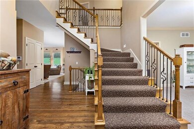 Dramatic 2 story entry with beautiful hardwoods an