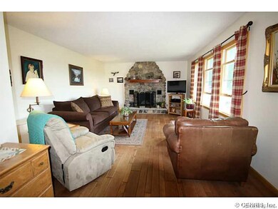 Living Room. Wood burning fireplace.