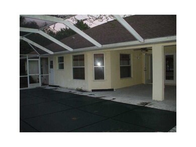 Exterior Back. Pool and Lanai area