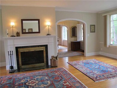 Living Room. Gracious wood fireplace...