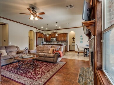 A VERY CUSTOM HOME WITH ARCHWAYS AND STAINED WOOD 