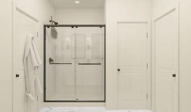 Primary bath with glass shower enclosure
