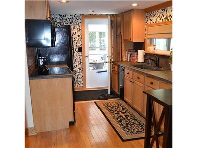 Kitchen. walk out to screened porch area.  Great f