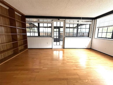 Living Room opens to Family Room