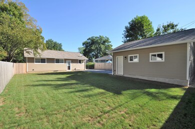 Regraded & fenced Backyard!